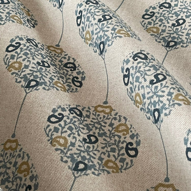 Linen-look cotton fabric with blue and gold medallion pattern